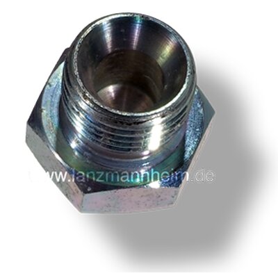 Oil drain plug on fuel tank