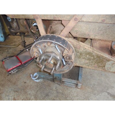 Foot brake system: Riveting on brake pads foot brake